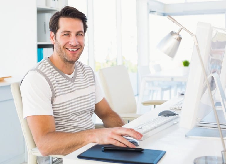 Young businessman working on his computer