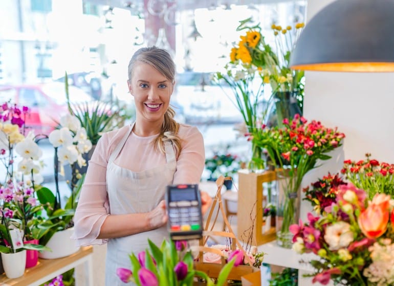 Florist taking a credit card payment